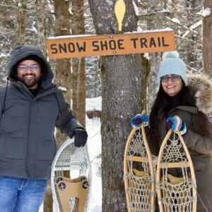 Harsh and Lovleen Goyal, who moved to Sault Ste. Marie from New Delhi, embraced Canada's winter weather, learning to snowshoe and exploring the ice caves on Lake Superior.